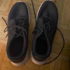 once used grey sports shoes